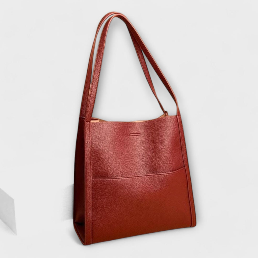 Cécile. – Handgmachti Läderhandtasche