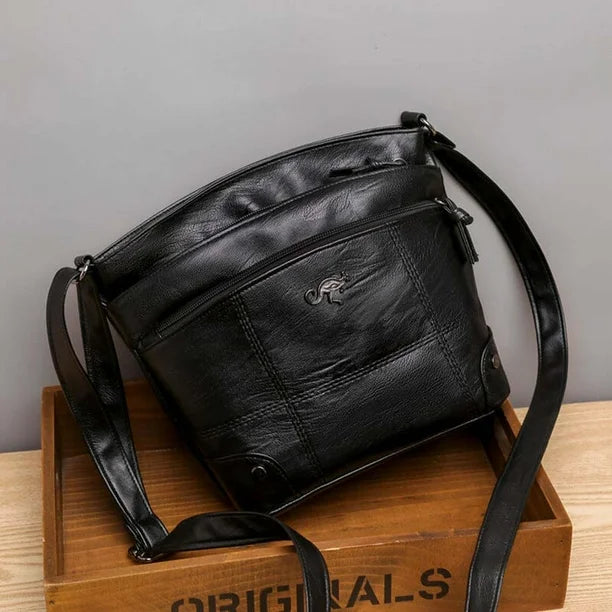 Judith – Eleganti Lederhandtasche mit Signatur