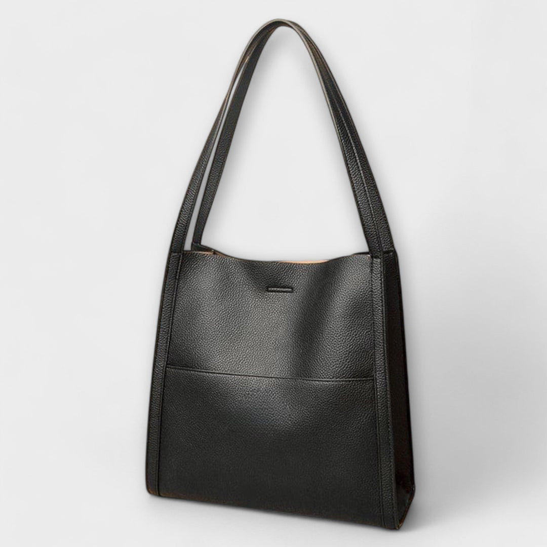 Cécile. – Handgmachti Läderhandtasche