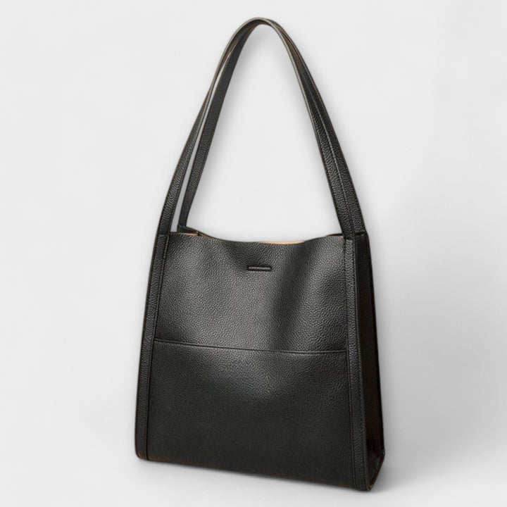Cécile. – Handgmachti Läderhandtasche
