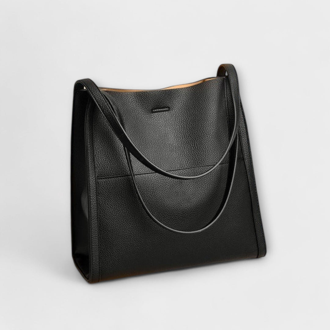 Cécile. – Handgmachti Läderhandtasche