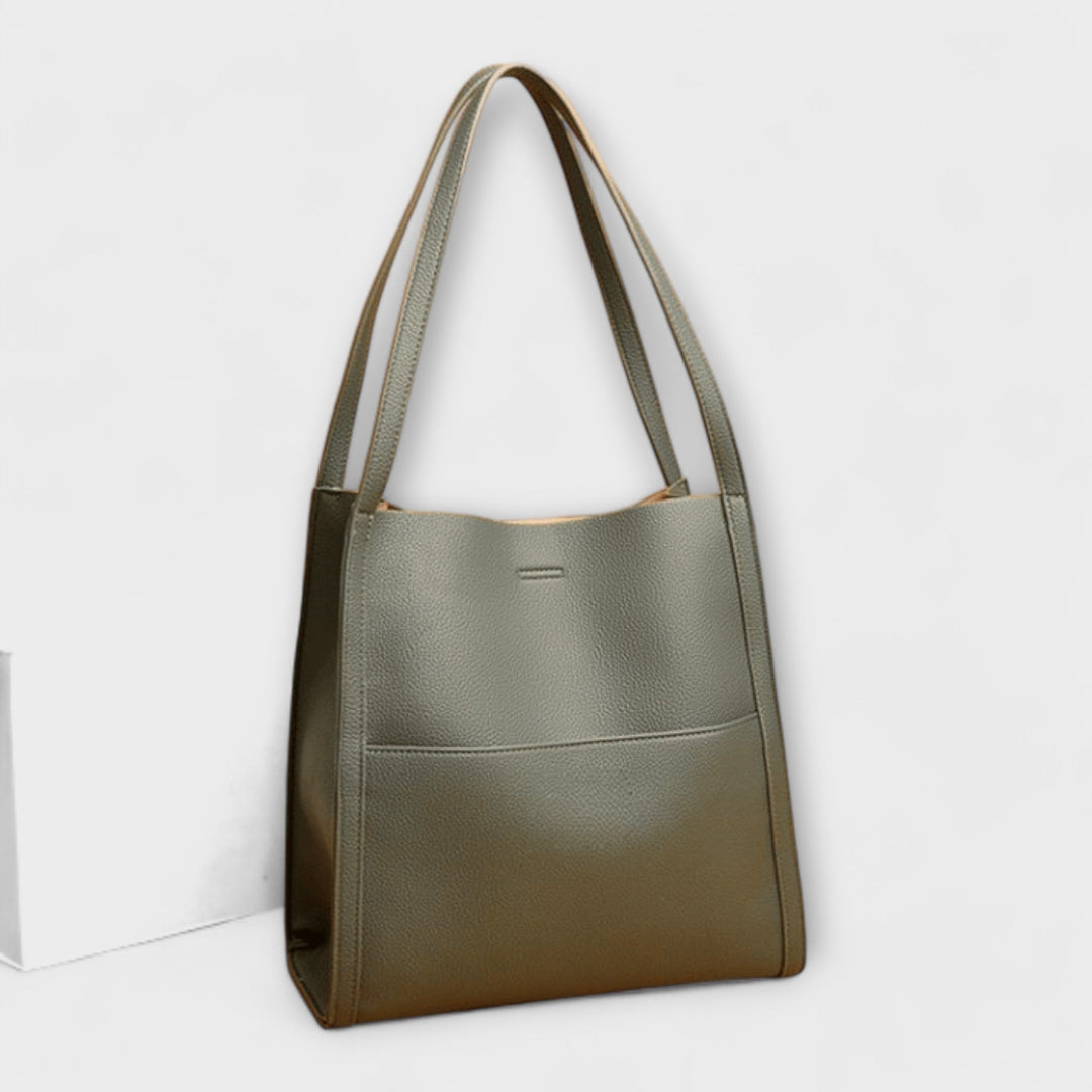 Cécile. – Handgmachti Läderhandtasche