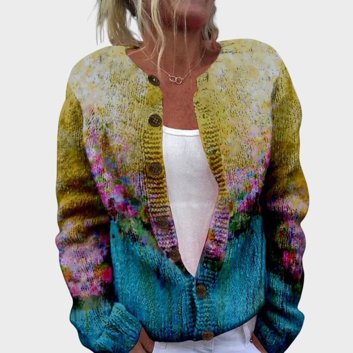 Rita – Bluemige Herbscht-Strickjacke