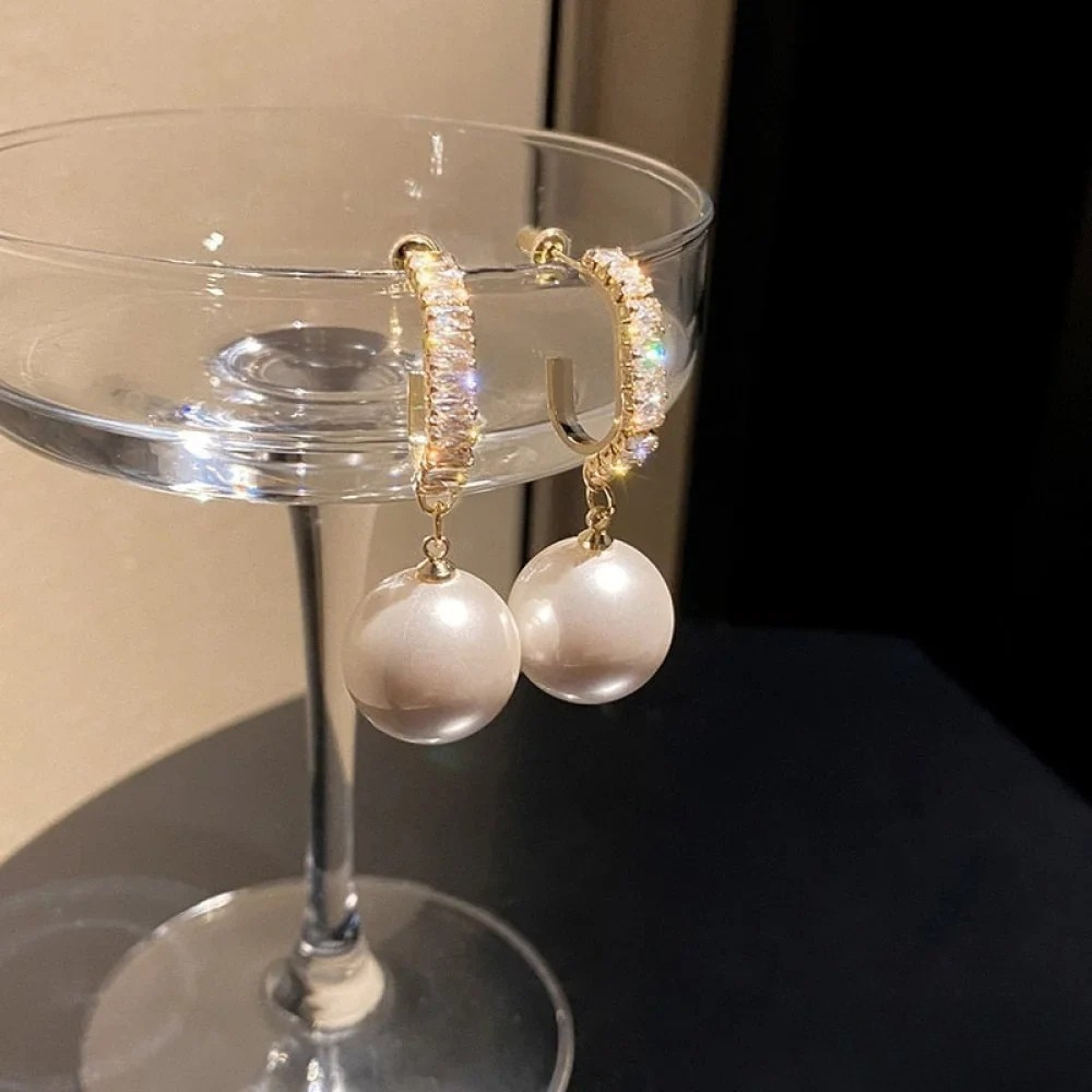 Eleganti Ohrhänger mit Perle-Akzänt