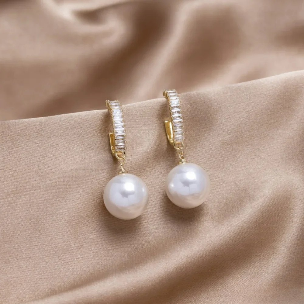 Eleganti Ohrhänger mit Perle-Akzänt