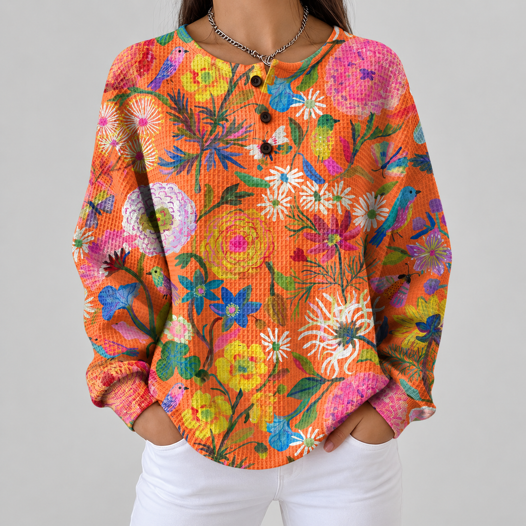 Florence – Orangefarbige Pulli mit Blueme