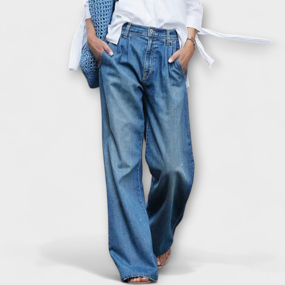 Hochwärtigi Jeans mit wiitem Bei