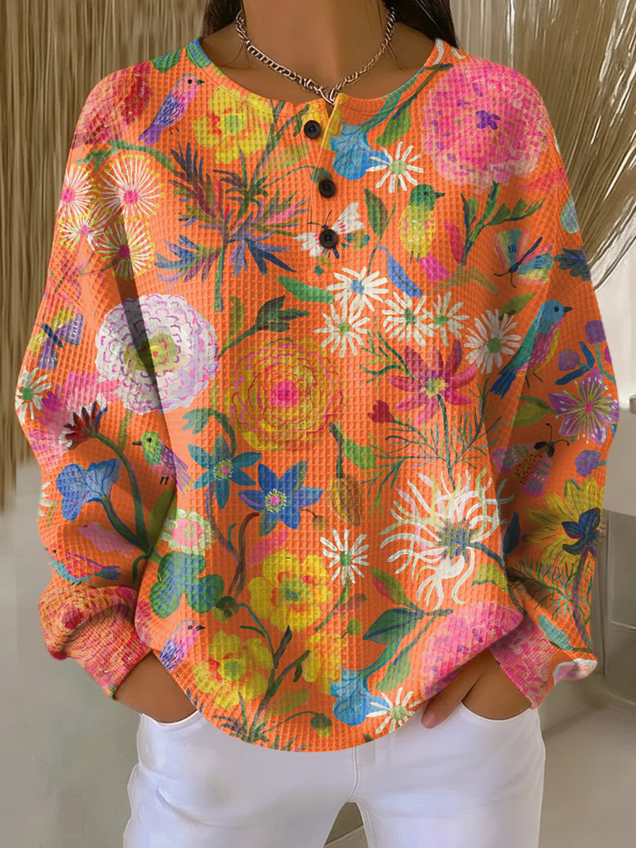 Florence – Orangefarbige Pulli mit Blueme