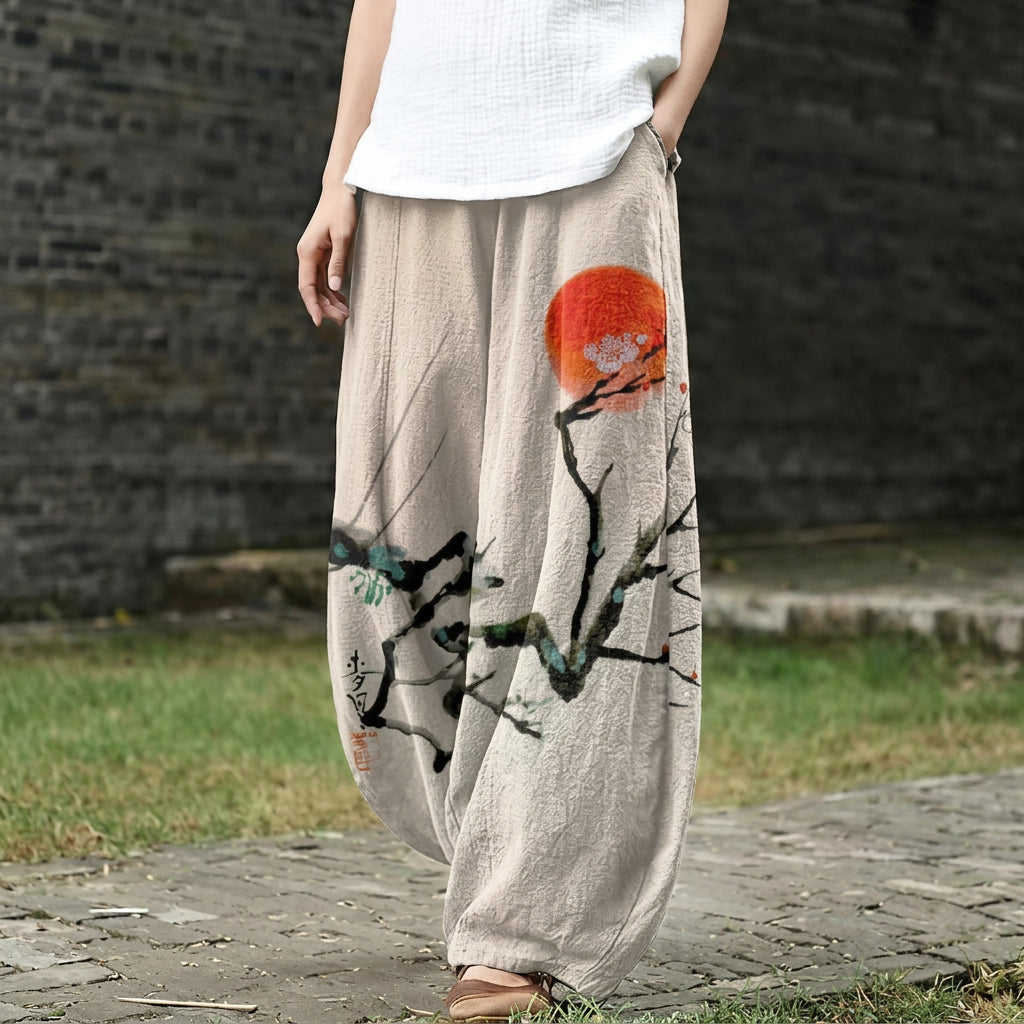 Léonie – Beigi, wiit gschnitte Hose mit Sunne-Motiv i Tinte
